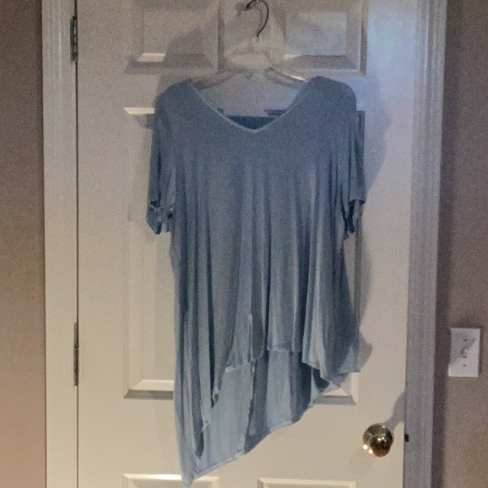 Lisa Rinna light blue drape top
